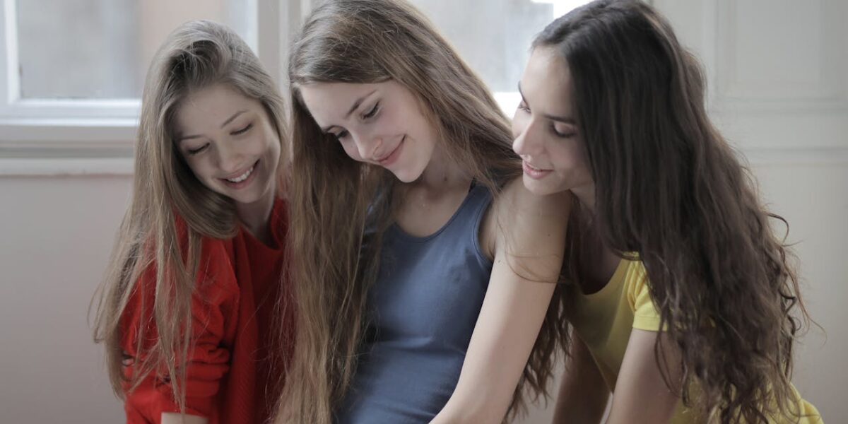 Photo by Andrea Piacquadio: https://www.pexels.com/photo/cheerful-friendly-women-surfing-internet-on-smartphone-together-at-home-3795309/