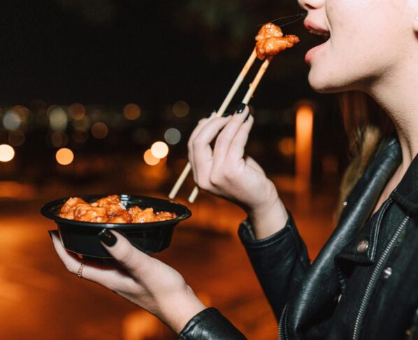 woman eat meat
