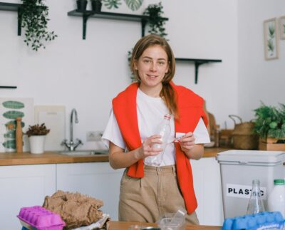 Photo by SHVETS production: https://www.pexels.com/photo/smiling-woman-stacking-paper-litter-for-reuse-7512807/