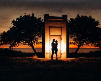 Photo by Вадим Биць: https://www.pexels.com/photo/silhouette-of-a-couple-kissing-on-the-beach-15418620/