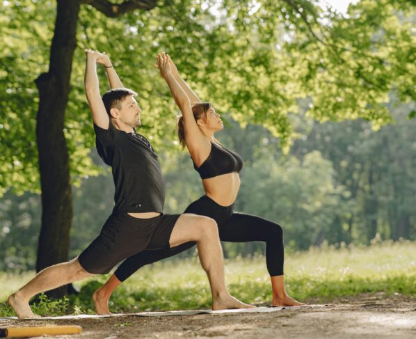 Photo by Gustavo Fring: https://www.pexels.com/photo/man-and-woman-practice-yoga-in-park-4971806/