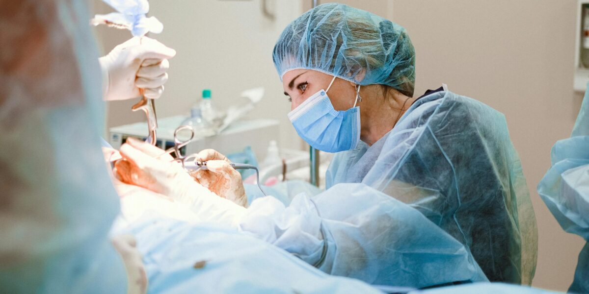 Photo by Anna Shvets: https://www.pexels.com/photo/woman-doing-a-surgery-on-a-patient-4421493/