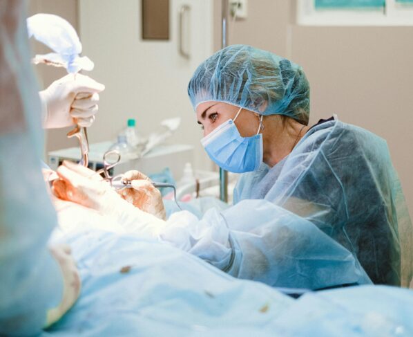 Photo by Anna Shvets: https://www.pexels.com/photo/woman-doing-a-surgery-on-a-patient-4421493/