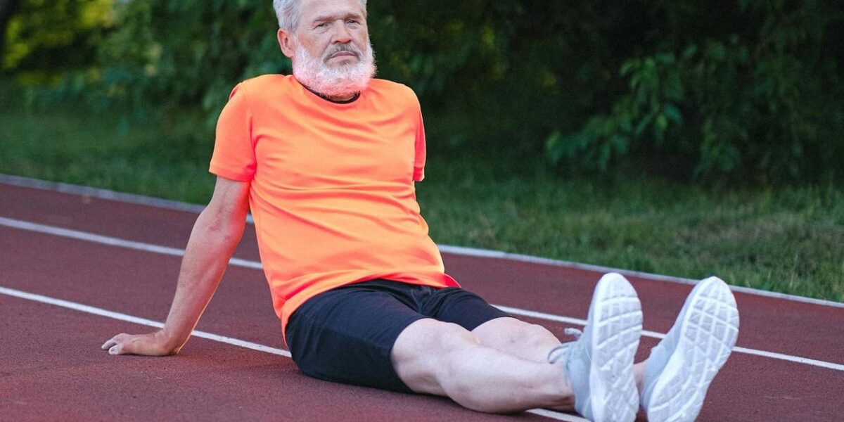 Photo by Anna Shvets: https://www.pexels.com/photo/senior-man-in-sportswear-sitting-on-stadium-5067747/