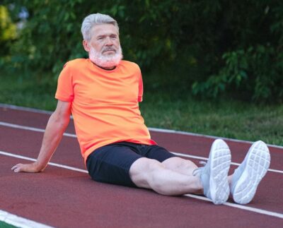 Photo by Anna Shvets: https://www.pexels.com/photo/senior-man-in-sportswear-sitting-on-stadium-5067747/