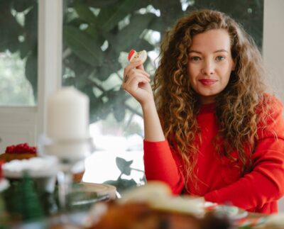 Photo by Tim Douglas : https://www.pexels.com/photo/content-woman-with-cookie-in-hand-6210707/