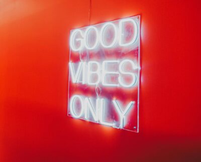 Photo by Victor Dunn: https://www.pexels.com/photo/a-neon-sign-on-a-red-wall-11587156/