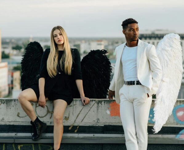 Photo by KoolShooters : https://www.pexels.com/photo/a-man-and-woman-wearing-angel-costumes-8513057/