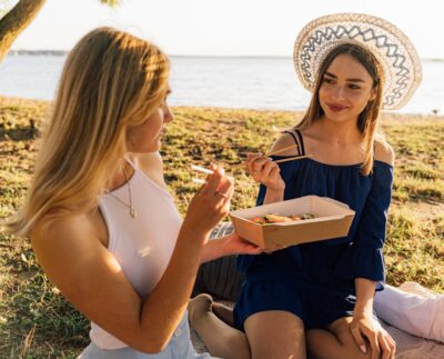 Photo by Antoni Shkraba: https://www.pexels.com/photo/women-eating-sushi-while-sitting-on-the-blanket-4989378/