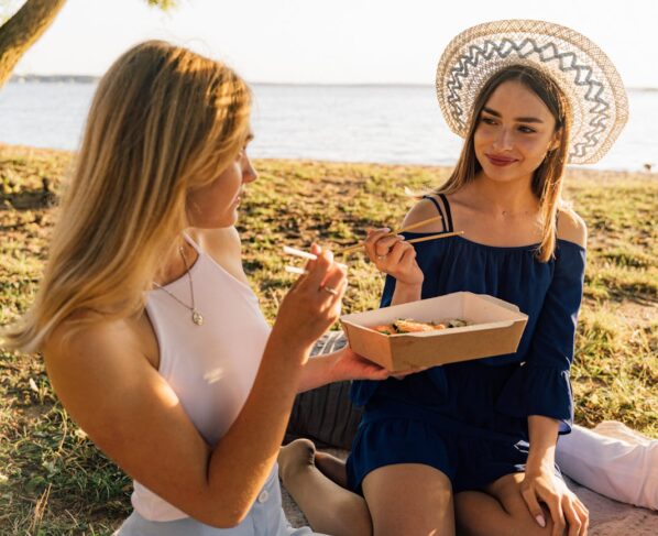 Photo by Antoni Shkraba: https://www.pexels.com/photo/women-eating-sushi-while-sitting-on-the-blanket-4989378/