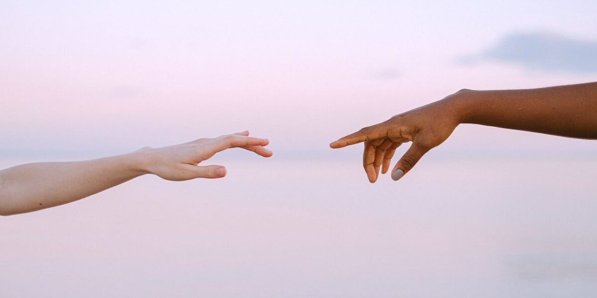 Photo by Anna Shvets: https://www.pexels.com/photo/photo-of-people-reaching-each-other-s-hands-4672717/