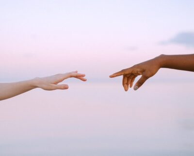 Photo by Anna Shvets: https://www.pexels.com/photo/photo-of-people-reaching-each-other-s-hands-4672717/