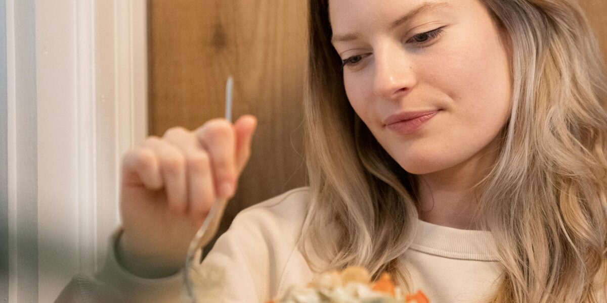 Photo by Kevin Malik: https://www.pexels.com/photo/a-woman-holding-white-ceramic-plate-with-food-9032663/