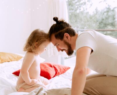 Photo by Tatiana Syrikova: https://www.pexels.com/photo/photo-of-man-leaning-his-forehead-on-child-s-forehead-3933076/