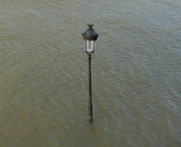 Photo by David Kouakou: https://www.pexels.com/photo/city-lamp-in-water-17641683/