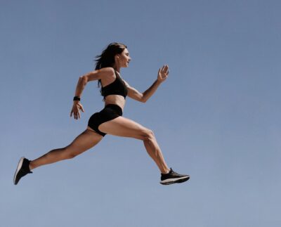 Photo by Maksim Goncharenok: https://www.pexels.com/photo/woman-in-black-sports-bra-and-white-shorts-jumping-4348631/