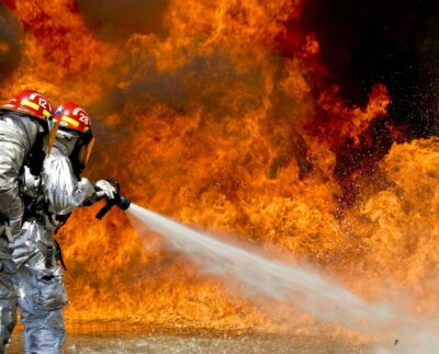 Photo by Pixabay: https://www.pexels.com/photo/photo-of-a-2-fireman-killing-a-huge-fire-69934/