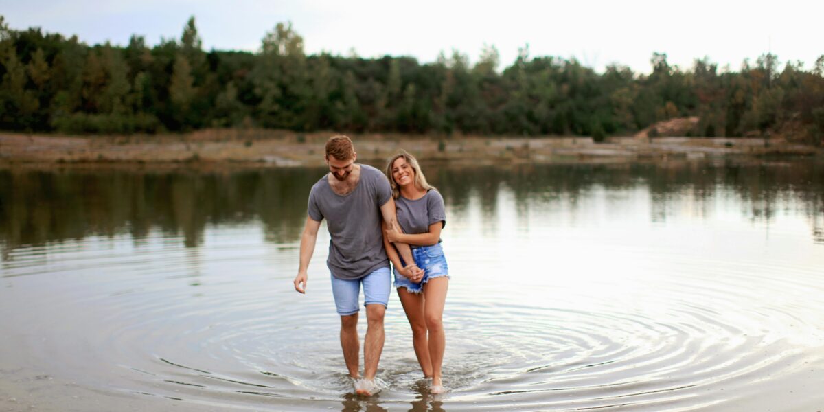 Photo by Leah Newhouse: https://www.pexels.com/photo/couple-wearing-grey-t-shirts-walking-on-shallow-water-and-smiling-1449668/