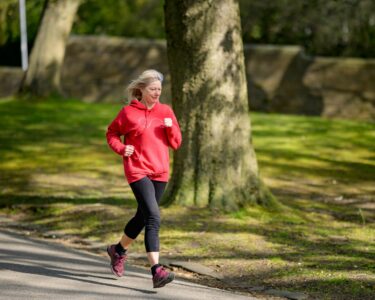 Photo by Centre for Ageing Better: https://www.pexels.com/photo/girl-in-red-hoodie-and-black-leggings-jogging-7849902/