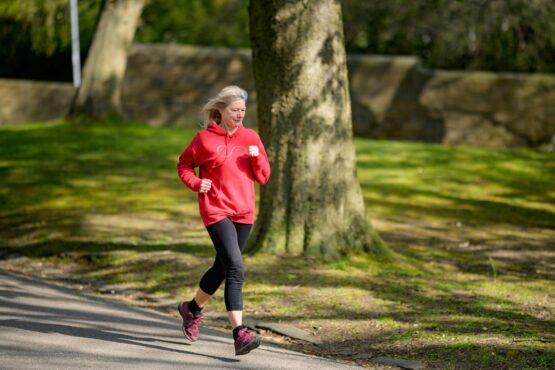 Photo by Centre for Ageing Better: https://www.pexels.com/photo/girl-in-red-hoodie-and-black-leggings-jogging-7849902/