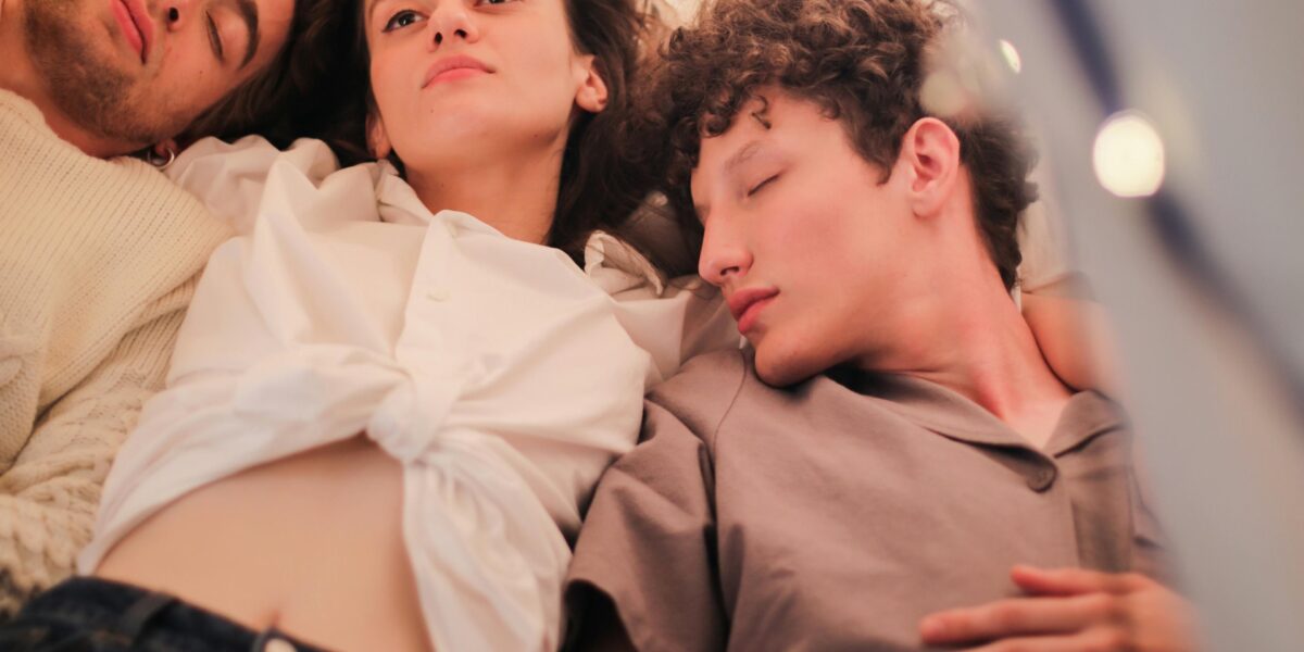 Photo by cottonbro studio: https://www.pexels.com/photo/man-in-brown-button-up-shirt-lying-beside-woman-in-black-denim-jeans-5018205/