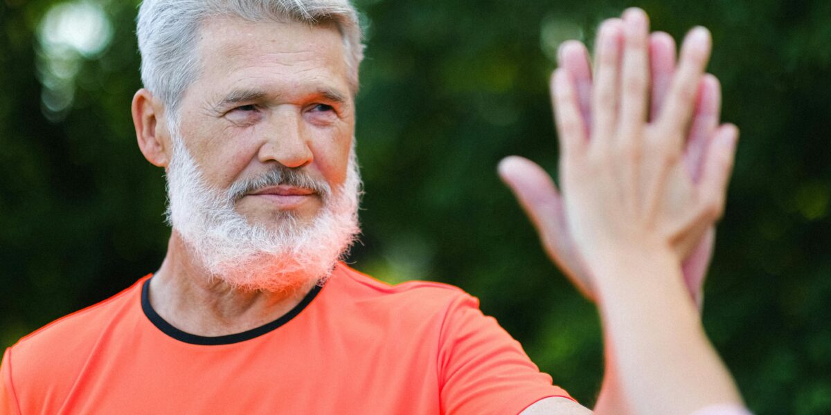 Photo by Anna Shvets: https://www.pexels.com/photo/pensive-aged-man-giving-high-five-to-friend-5067767/