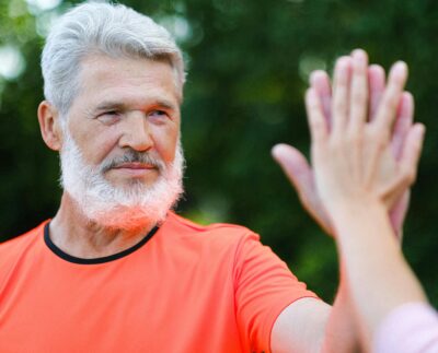 Photo by Anna Shvets: https://www.pexels.com/photo/pensive-aged-man-giving-high-five-to-friend-5067767/