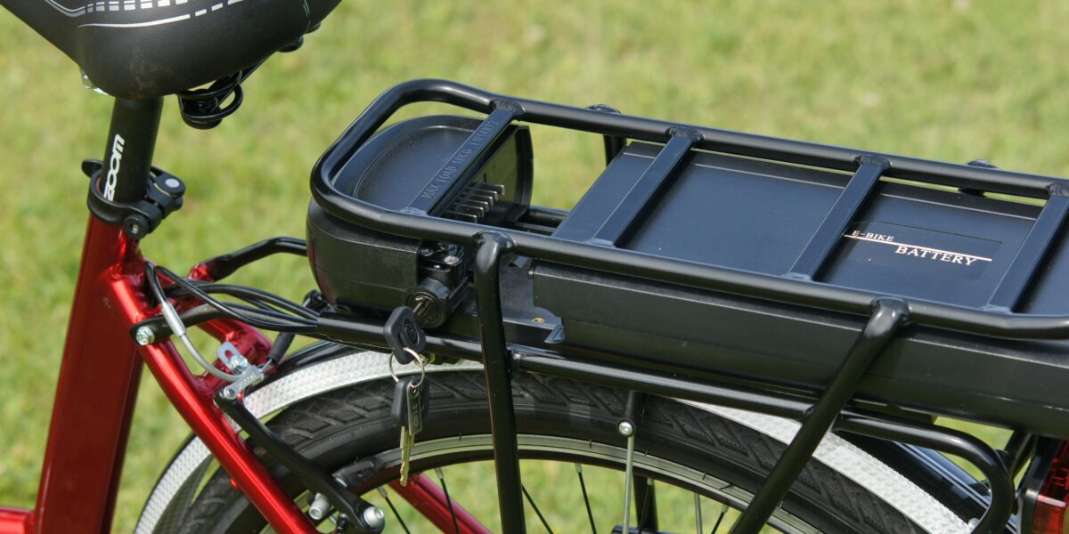 Photo by alex: https://www.pexels.com/photo/a-black-battery-case-on-a-red-e-bike-in-close-up-shot-11951153/