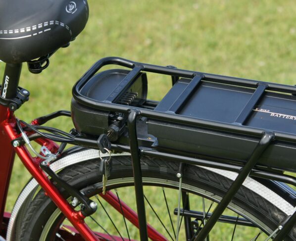 Photo by alex: https://www.pexels.com/photo/a-black-battery-case-on-a-red-e-bike-in-close-up-shot-11951153/