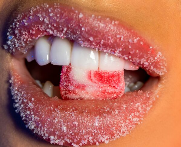 Photo by Alex Gonzo: https://www.pexels.com/photo/lips-of-woman-eating-jellybean-27101280/