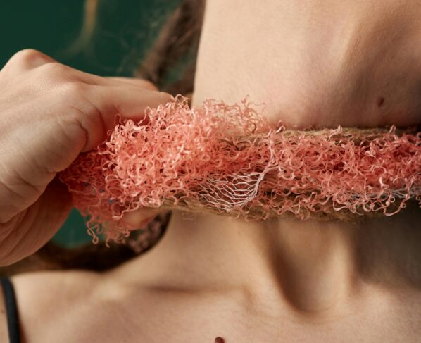 Photo by Julia M Cameron: https://www.pexels.com/photo/woman-holding-rope-on-neck-6994707/