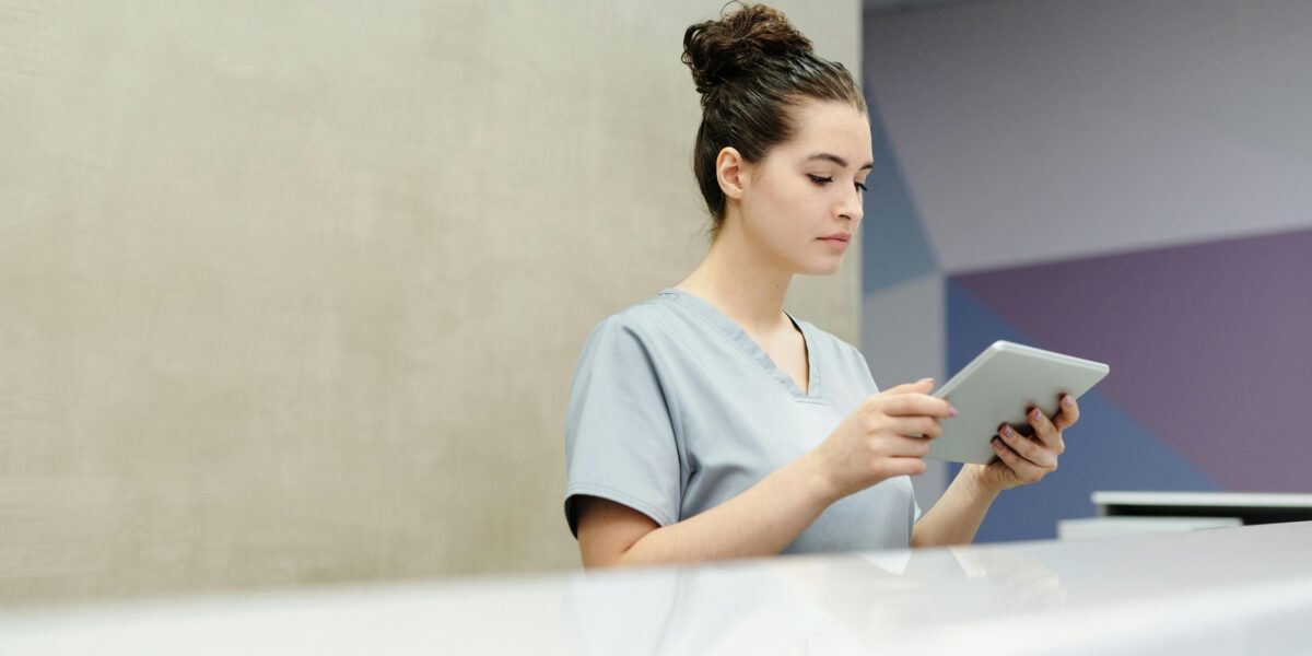 Photo by Cedric Fauntleroy: https://www.pexels.com/photo/a-receptionist-looking-at-a-tablet-4269275/