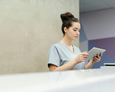 Photo by Cedric Fauntleroy: https://www.pexels.com/photo/a-receptionist-looking-at-a-tablet-4269275/