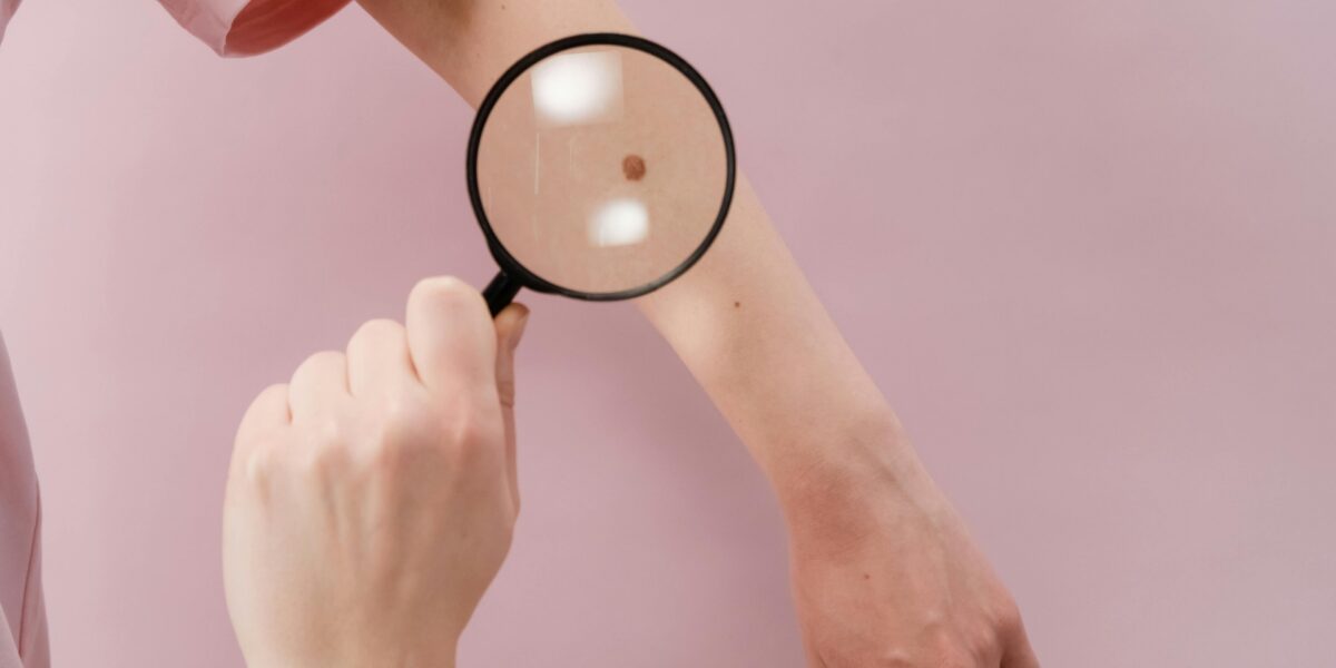 Photo by cottonbro studio: https://www.pexels.com/photo/person-holding-magnifying-glass-with-white-background-5701545/