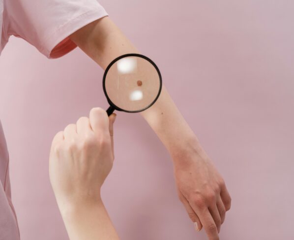 Photo by cottonbro studio: https://www.pexels.com/photo/person-holding-magnifying-glass-with-white-background-5701545/