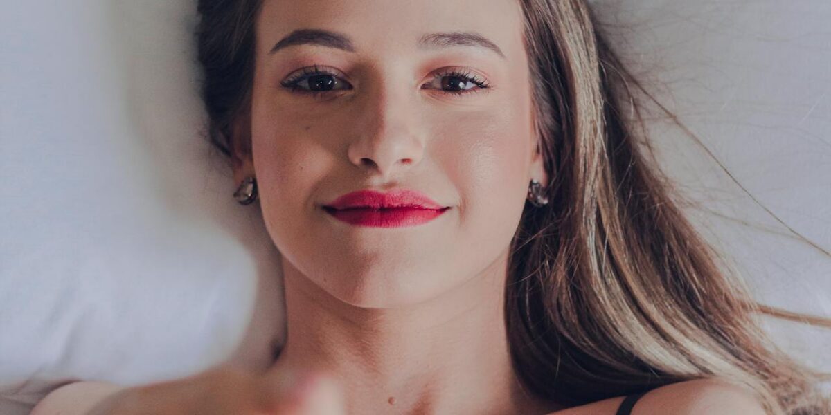 Photo by Heitor Verdi: https://www.pexels.com/photo/sensual-woman-with-red-lips-pointing-at-camera-4118659/