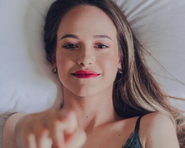Photo by Heitor Verdi: https://www.pexels.com/photo/sensual-woman-with-red-lips-pointing-at-camera-4118659/