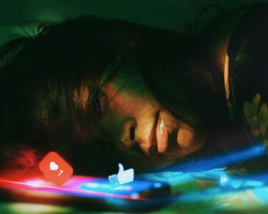 Photo by Andre Moura: https://www.pexels.com/photo/photo-of-woman-lying-beside-a-phone-2753486/