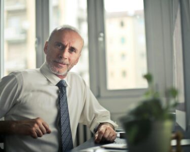 Photo by Andrea Piacquadio: https://www.pexels.com/photo/man-sitting-on-chair-beside