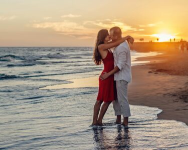 Photo by Summer Stock: https://www.pexels.com/photo/couple-kissing-on-beach-during-golden-hour-285938/