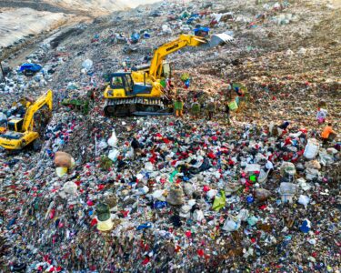 Photo by Tom Fisk: https://www.pexels.com/photo/heavy-equipments-on-landfill-5433129/