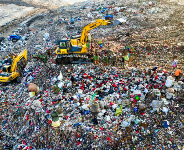 Photo by Tom Fisk: https://www.pexels.com/photo/heavy-equipments-on-landfill-5433129/