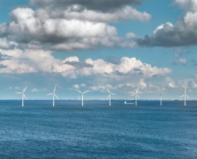 Photo by Enrique: https://www.pexels.com/photo/wind-turbines-in-the-sea-11001079/