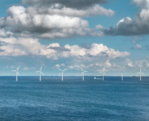 Photo by Enrique: https://www.pexels.com/photo/wind-turbines-in-the-sea-11001079/