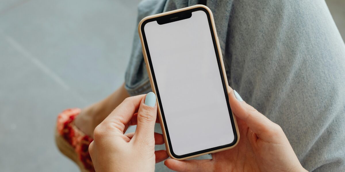 Photo by Photo By: Kaboompics.com: https://www.pexels.com/photo/person-holding-a-phone-8947145/