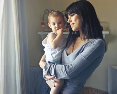 Photo by Andrea Piacquadio: https://www.pexels.com/photo/mother-carrying-her-baby-boy-755028/