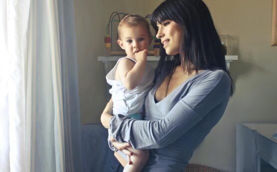 Photo by Andrea Piacquadio: https://www.pexels.com/photo/mother-carrying-her-baby-boy-755028/