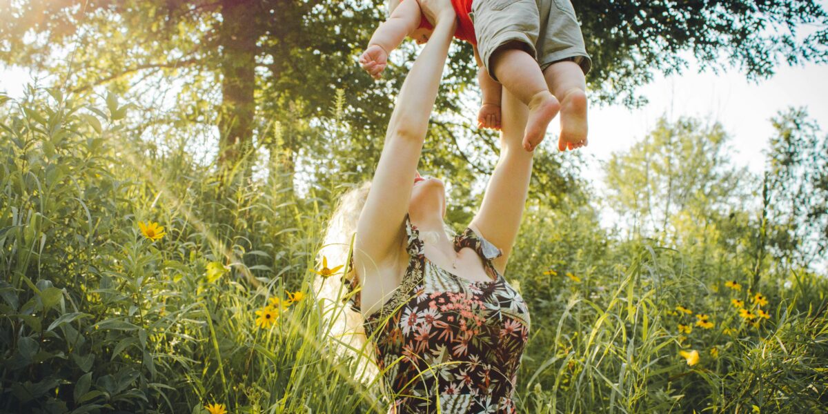 Photo by Creation Hill: https://www.pexels.com/photo/mother-lifting-her-baby-1261909/