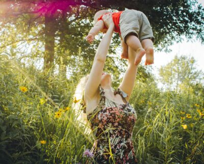 Photo by Creation Hill: https://www.pexels.com/photo/mother-lifting-her-baby-1261909/