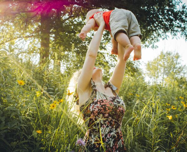 Photo by Creation Hill: https://www.pexels.com/photo/mother-lifting-her-baby-1261909/